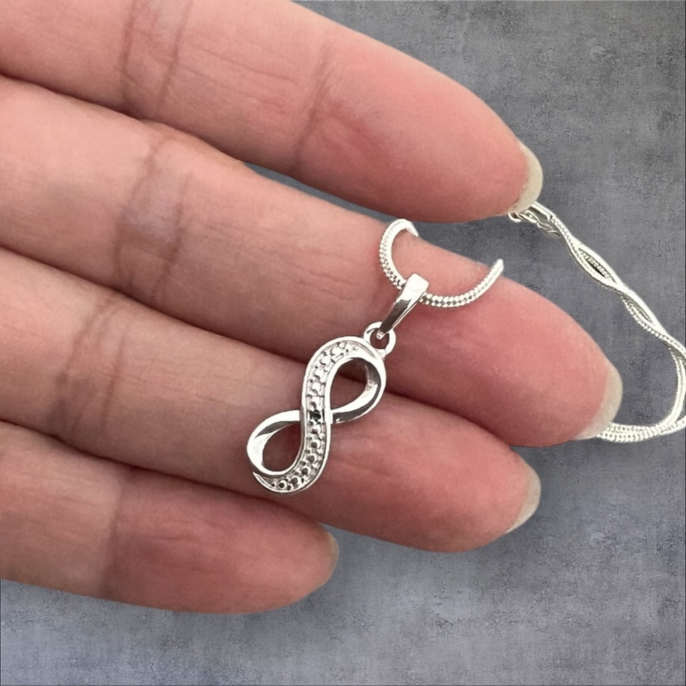 18K Gold plated infinity pendant. Plus Free necklace
